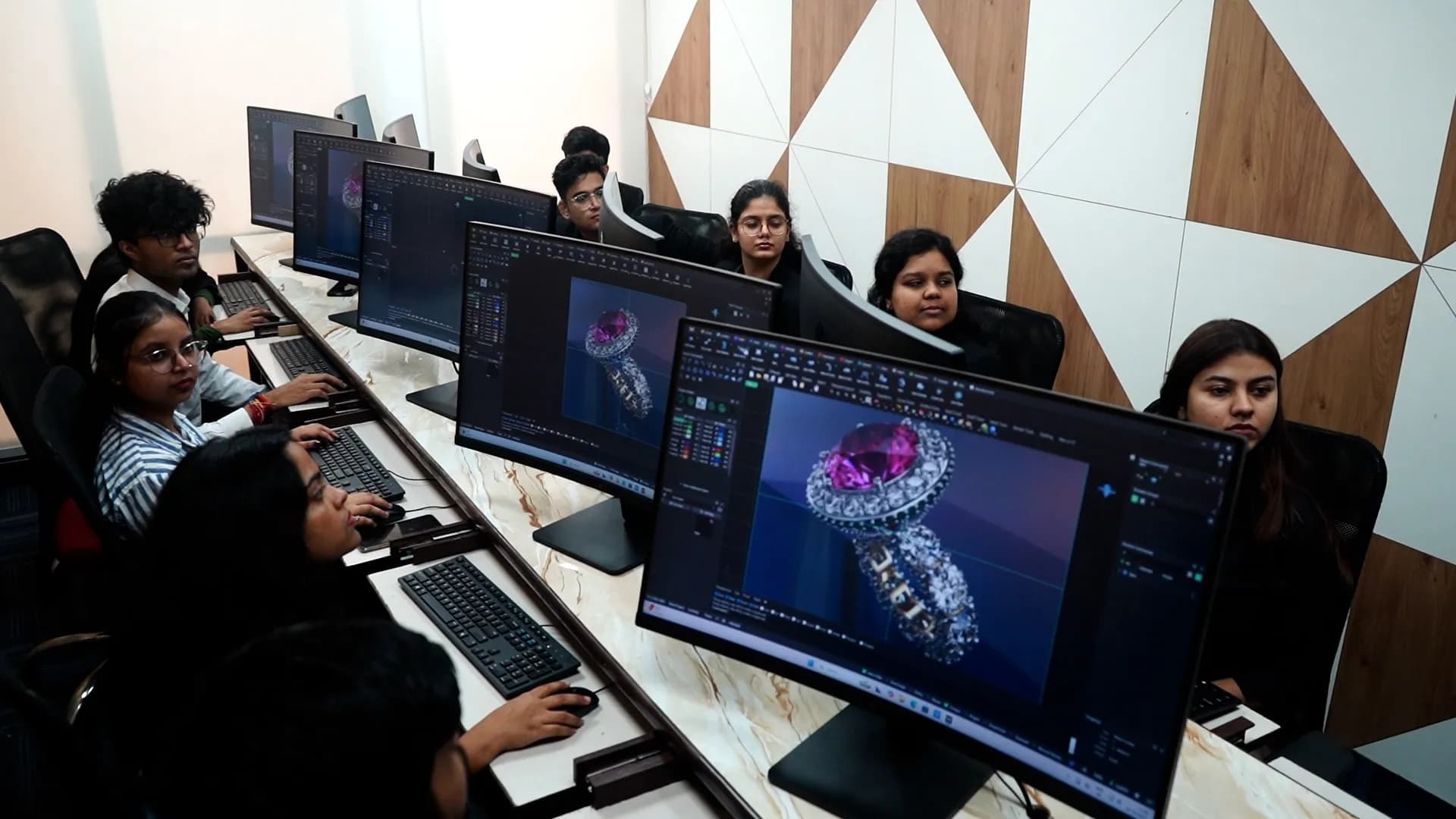 The CAD lab in session — a diamond ring render on screen