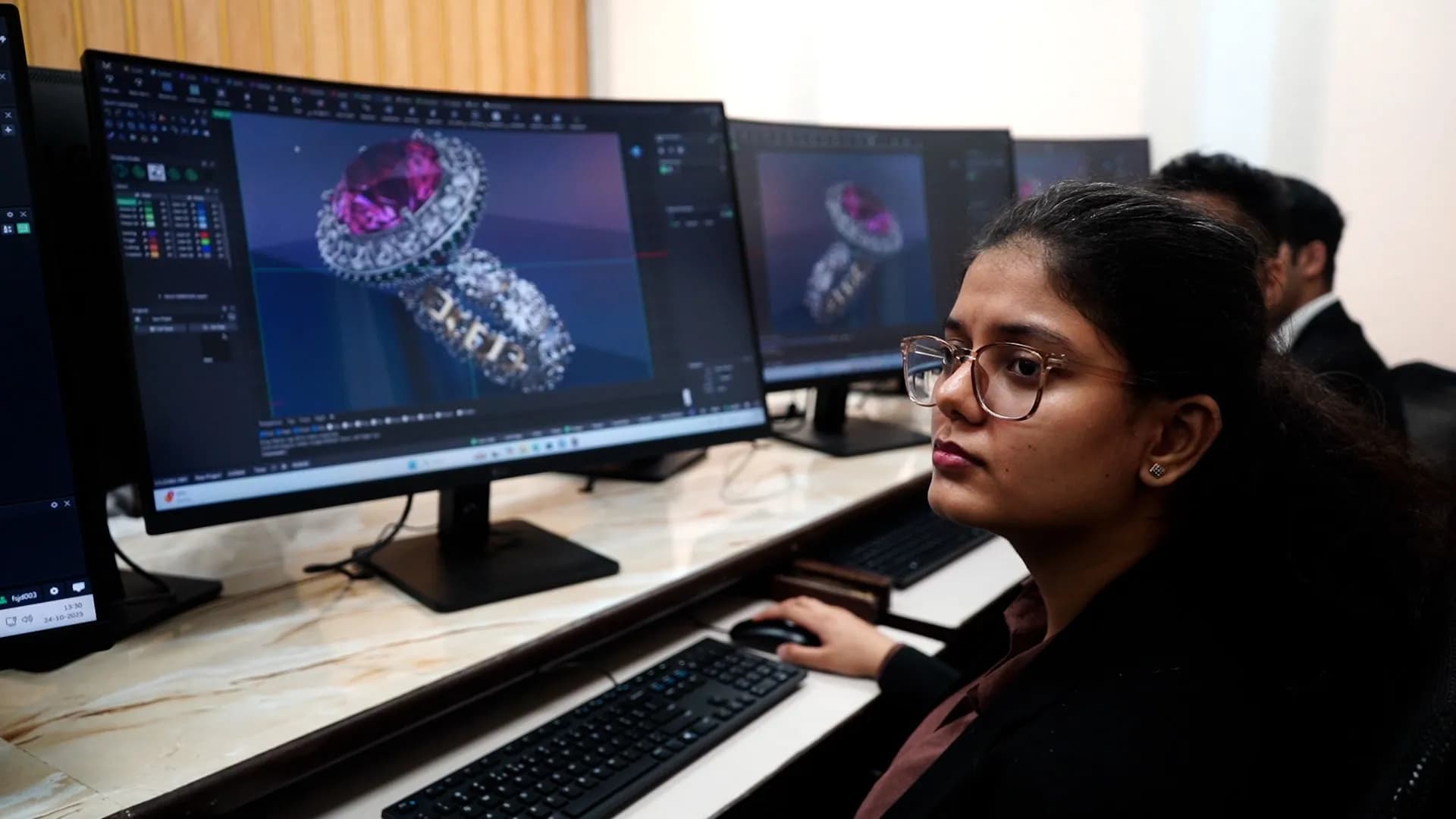 A student rendering a gemstone ring in CAD (Matrix)